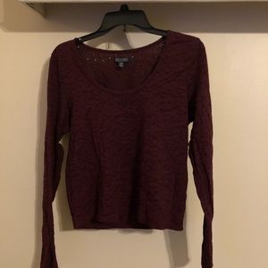 A maroon laced shirt